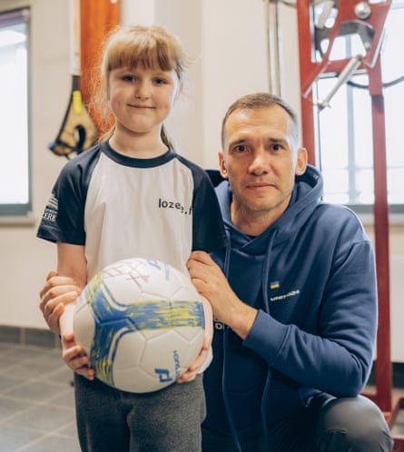 Andriy Shevchenko with Maryna, the first child in Ukraine to receive a prosthetic limb after her leg was blown off by a Russian missile. Andriy Shevchenko with Maryna, the first child in Ukraine to receive a prosthetic limb after her leg was blown off by a Russian missile.