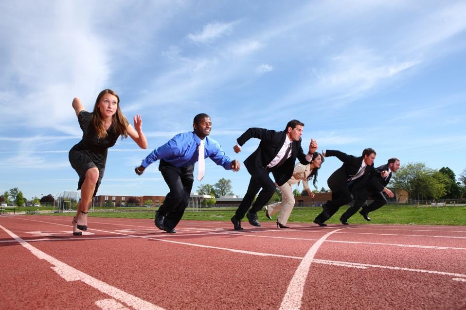 Business people racing on track