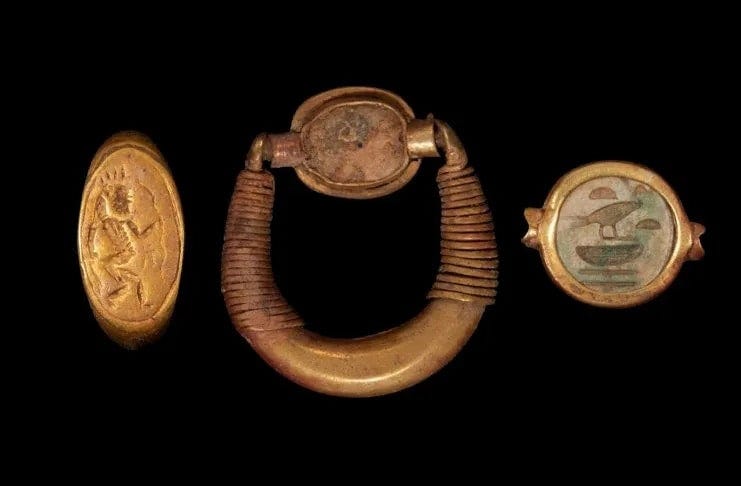 Finds comprise three rings and one necklace.