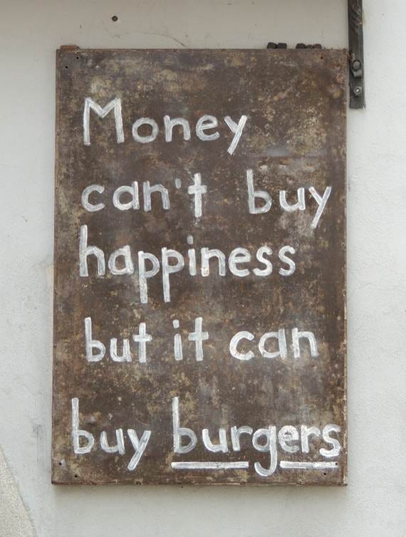 A sign with white writing on it

AI-generated content may be incorrect.