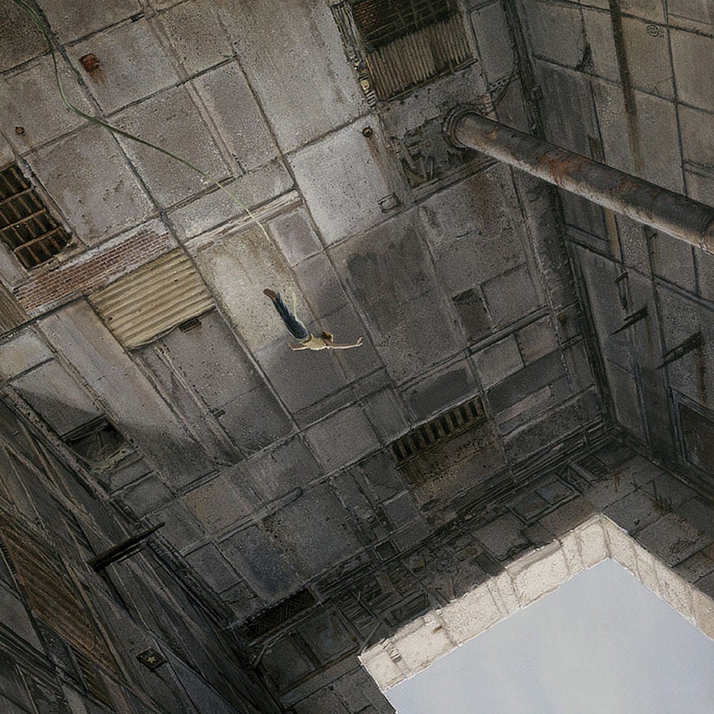 A disconcerting angled view down as a woman dives through a massive chamber toward a square opening below. The walls of the chamber are mix of odd shaped rectangular concrete panels with rusted greats, boards and bricks breaking up the monotony of the facade. An elastic line trails the diver loosely as she spreads her arms out wide carried downward by gravity. Her feet are together and her back arcs slightly in perfect form as she shoots through the space toward the light below. A disconcerting angled view down as a woman dives through a massive chamber toward a square opening below. The walls of the chamber are mix of odd shaped rectangular concrete panels with rusted greats, boards and bricks breaking up the monotony of the facade. An elastic line trails the diver loosely as she spreads her arms out wide carried downward by gravity. Her feet are together and her back arcs slightly in perfect form as she shoots through the space toward the light below.