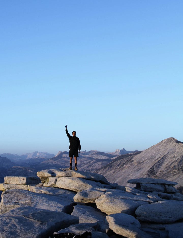 man and woman on mountain top