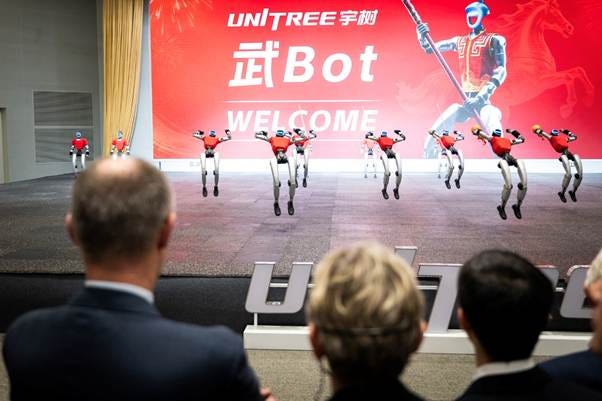 The photo shows Federal Chancellor Friedrich Merz at a demonstration of humanoid robots. The photo shows Federal Chancellor Friedrich Merz at a demonstration of humanoid robots.