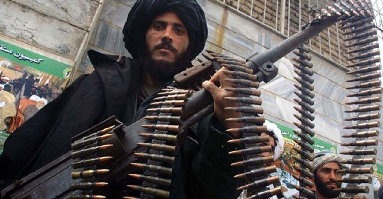 A member of the Taliban poses in 2013. Creative Commons photo/eyevine.