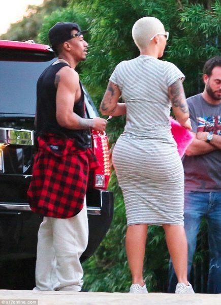 nick cannon cozying up with amber rose relationship 2015