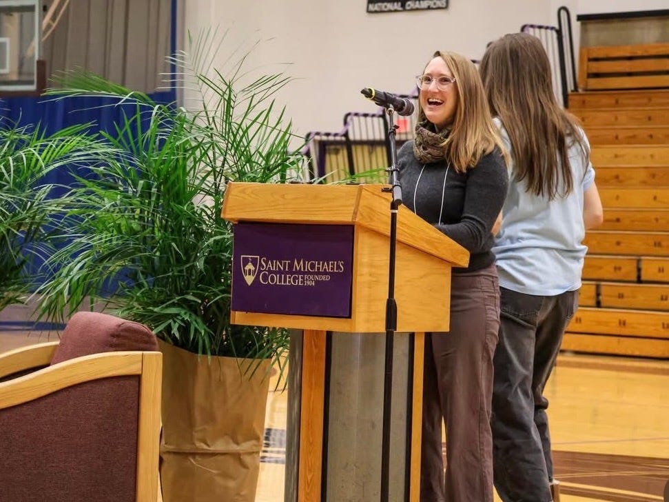 A woman speaking at a podium