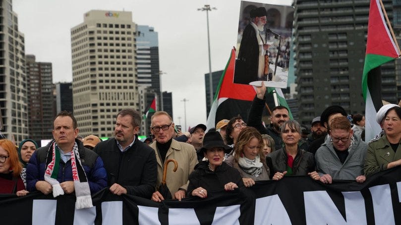 The image posted to Bob Carr's X account featuring Ayatollah Khamenei in the background. The image posted to Bob Carr's X account featuring Ayatollah Khamenei in the background.