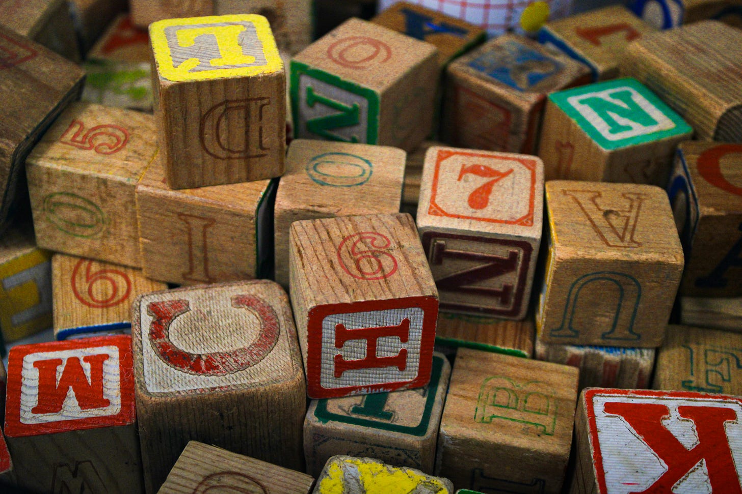 a group of old time alphabet blocks (writers build an e mail list)