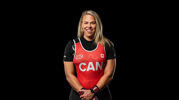 Photo of April Hutchinson warming up and focusing before a tournament, representing Team Canada Photo of April Hutchinson warming up and focusing before a tournament, representing Team Canada