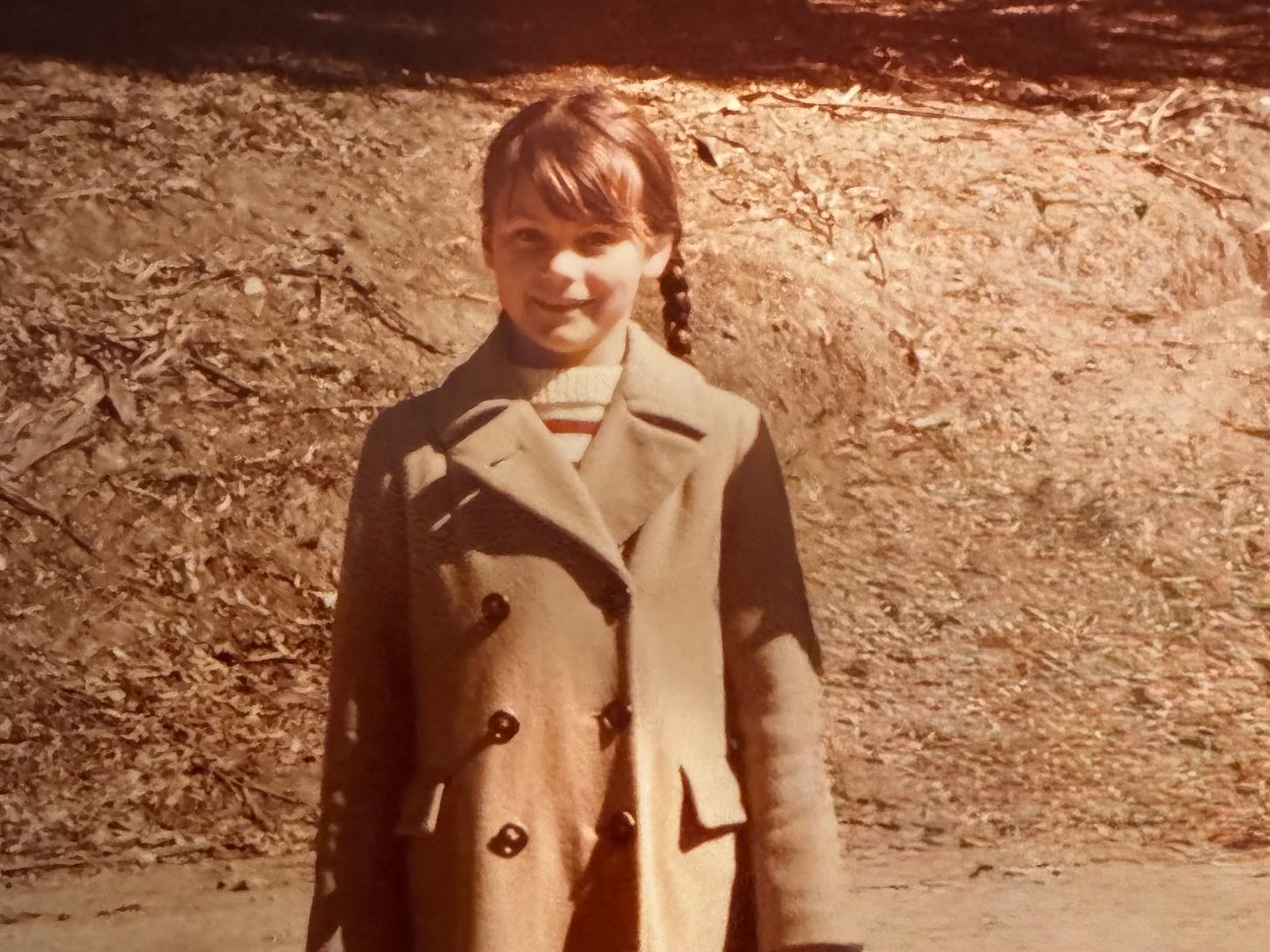 young girl wearing coat