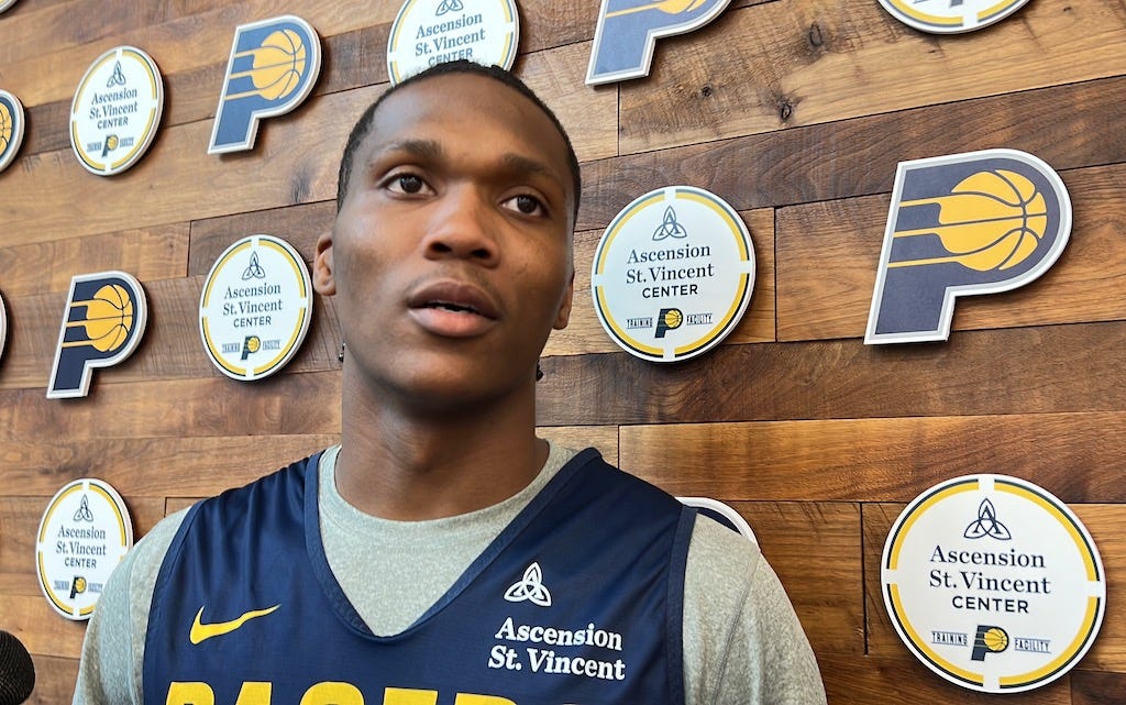 Bennedict Mathurin talks with reporters after summer practice.
