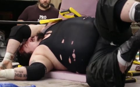 [Screenshot: Dykes in remains of a saw board]