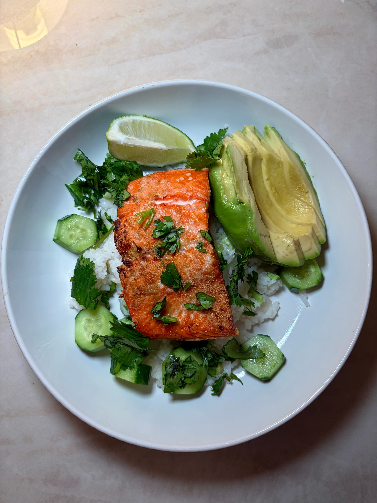 These garlic ginger salmon bowls are made with air fryer salmon, fluffy jasmine edamame rice, fresh cucumber, creamy avocado, and an optional spicy mayo drizzle. A high-protein, gluten-free, dairy-free dinner ready in just 30 minutes — perfect for weeknight meal prep.
