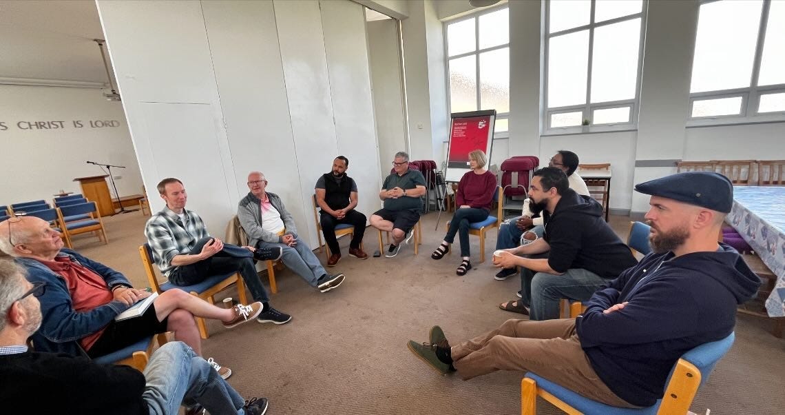 May be an image of 8 people and people studying