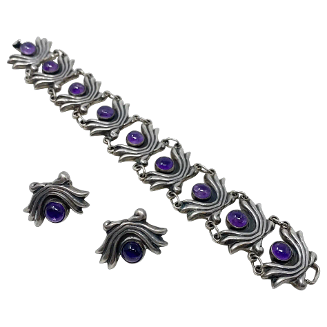 https://www.rubylane.com/item/2013583-ABG192/Taxco-Sterling-Floral-Motif-Link-Bracelet