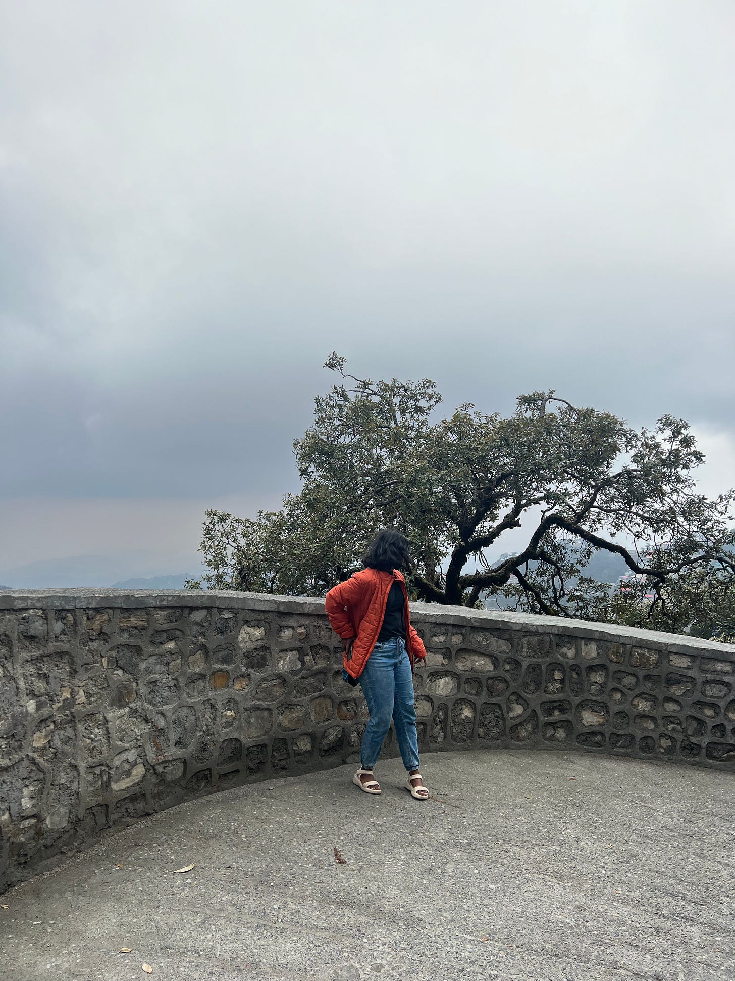 Photo of author on a slanting road on the way to Landour