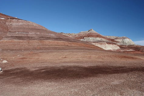 Images of barren landscapes and sky which is mainly blue