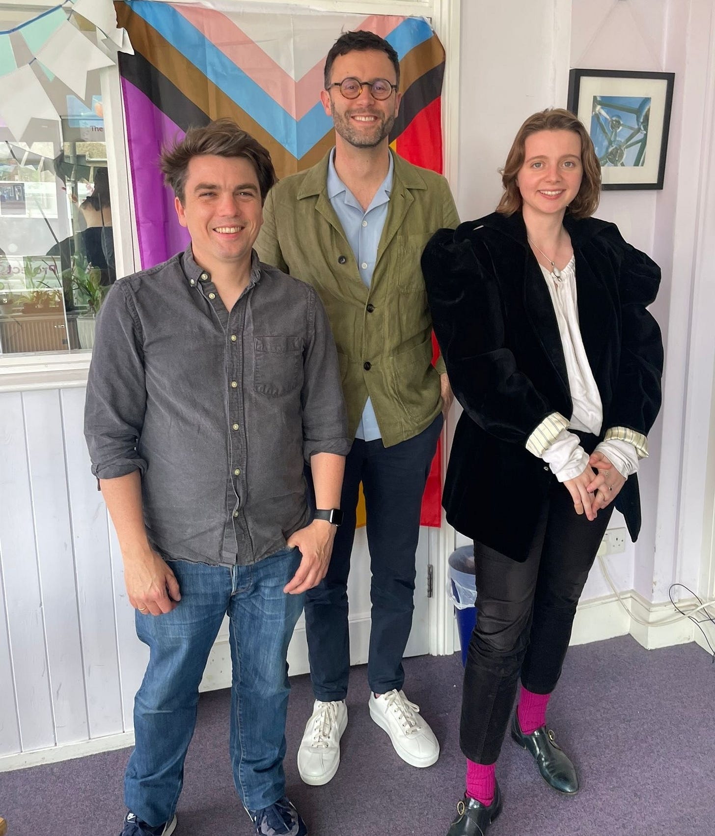 May be an image of 3 people and suit