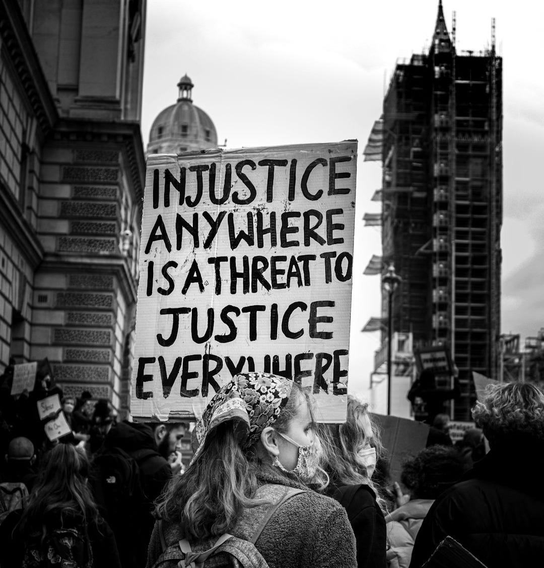 grayscale photo of people walking on street