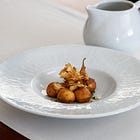 Sopa de carxofes amb bunyols de bacallà