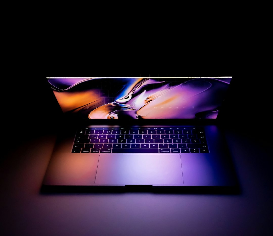 turned on laptop on table