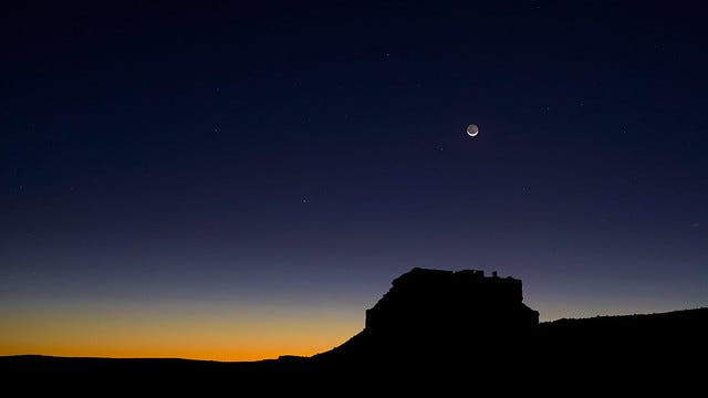crescent moon rising over Fajada Butte before dawn on October 4, 2021 from near the south entrance to the park crescent moon rising over Fajada Butte before dawn on October 4, 2021 from near the south entrance to the park