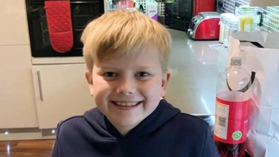 George Fox smiling to the camera George Fox smiling to the camera