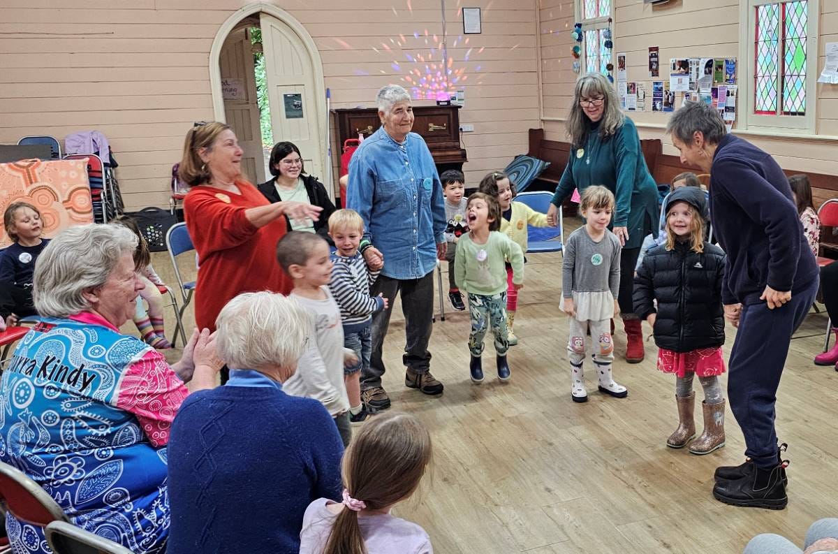 Playing the gorilla game in the intergenerational play session Playing the gorilla game in the intergenerational play session