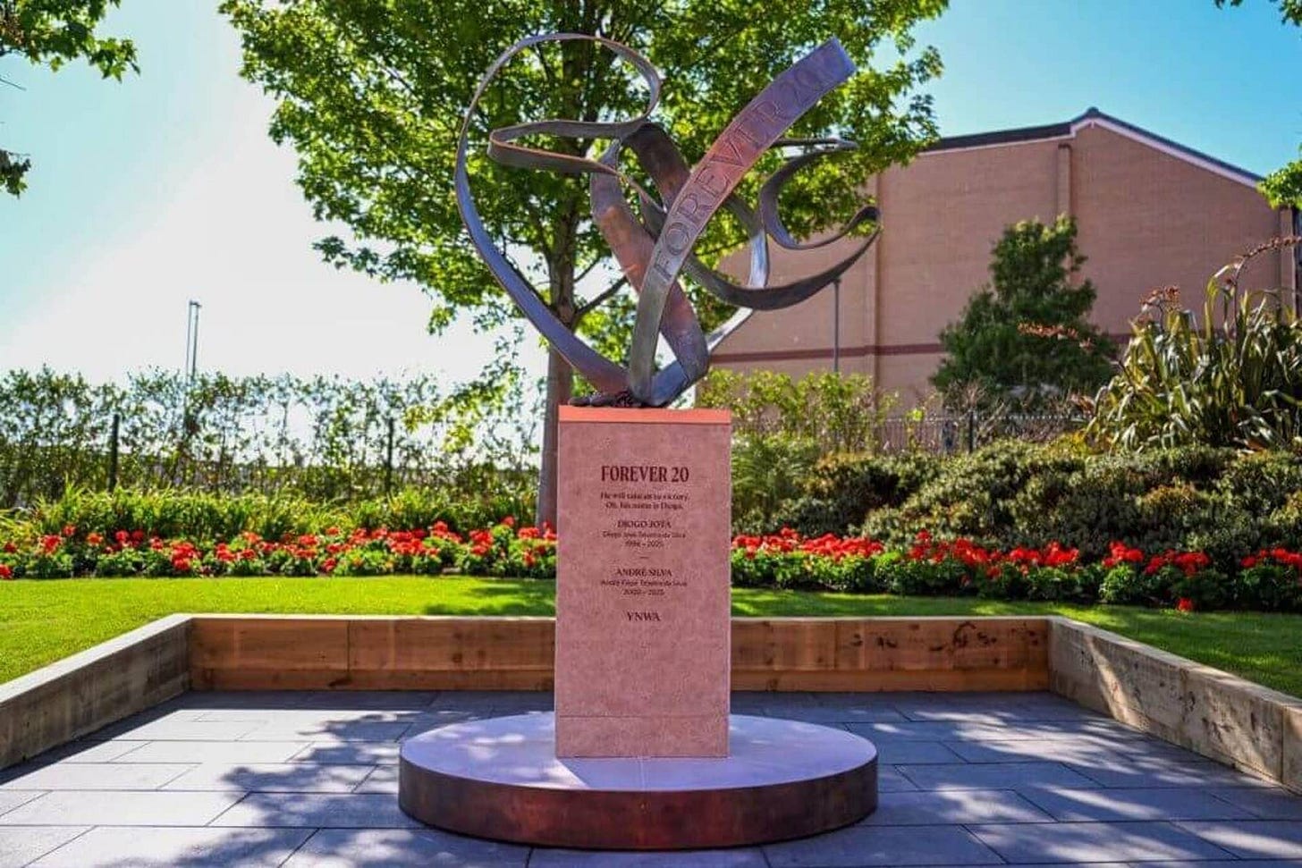 A memorial to Diogo Jota and Andre Silva at Anfield, a flowing heart sculpture A memorial to Diogo Jota and Andre Silva at Anfield, a flowing heart sculpture