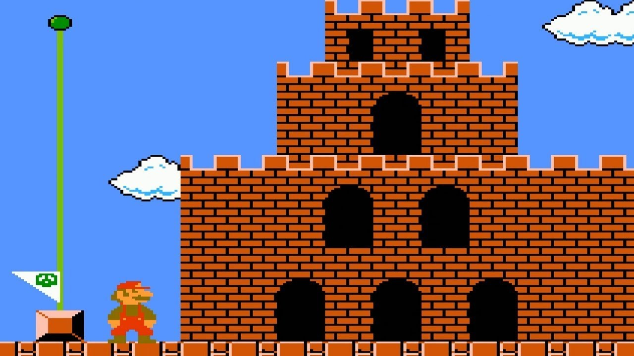 Super Mario Bros – zámek a stožár s vlajkou na konci levelu.