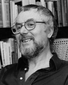 A person wearing glasses and smiling
Description automatically generated A person wearing glasses and smiling
Description automatically generated