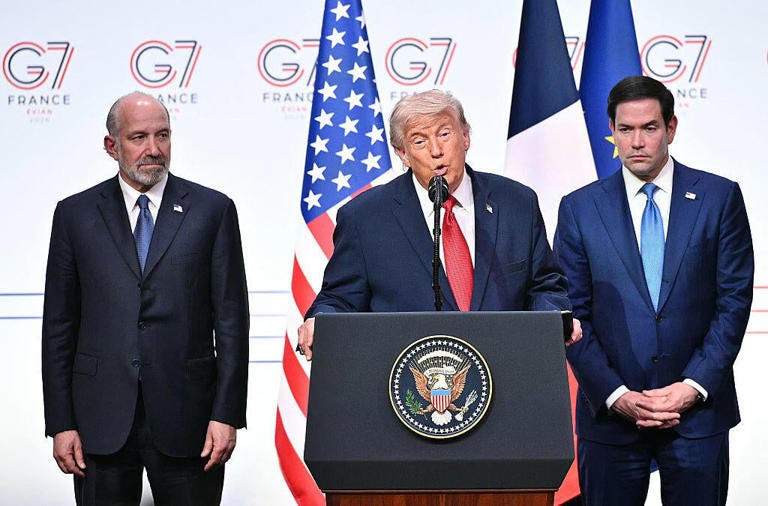 President Trump speaks alongside Secretary of State Marco Rubio and Commerce Secretary Howard Lutnick during a closing press conference at the G7 summit in Evian-les-Bains, France, on June 17, 2026. / Credit: Mandel NGAN /AFP via Getty Images