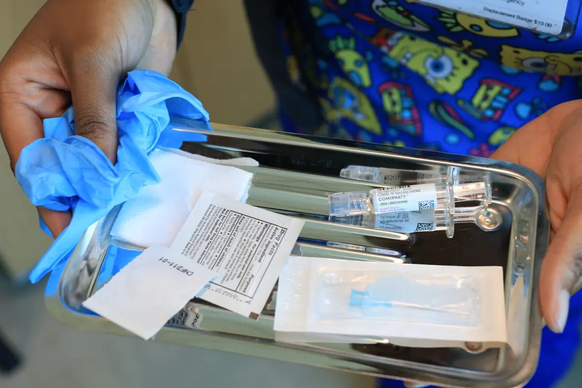 A nurse carries a tray with a Pfizer-BioNTech COVID-19 vaccine at Borinquen Health Care Center in Miami on May 29, 2025. (Joe Raedle/Getty Images) A nurse carries a tray with a Pfizer-BioNTech COVID-19 vaccine at Borinquen Health Care Center in Miami on May 29, 2025. (Joe Raedle/Getty Images)