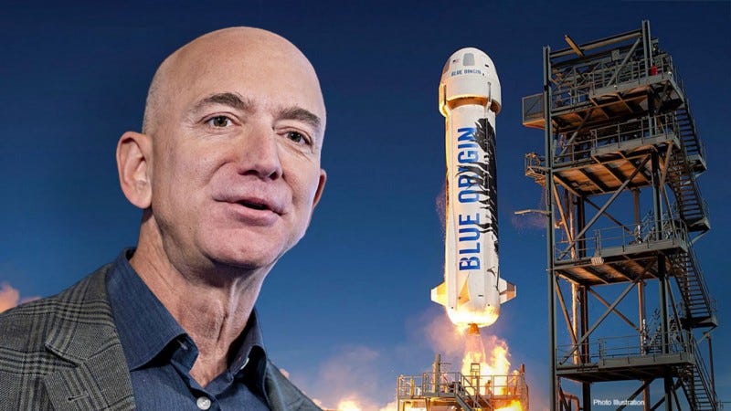 Jeff Bezos beside a Blue Origin rocket. Jeff Bezos beside a Blue Origin rocket.