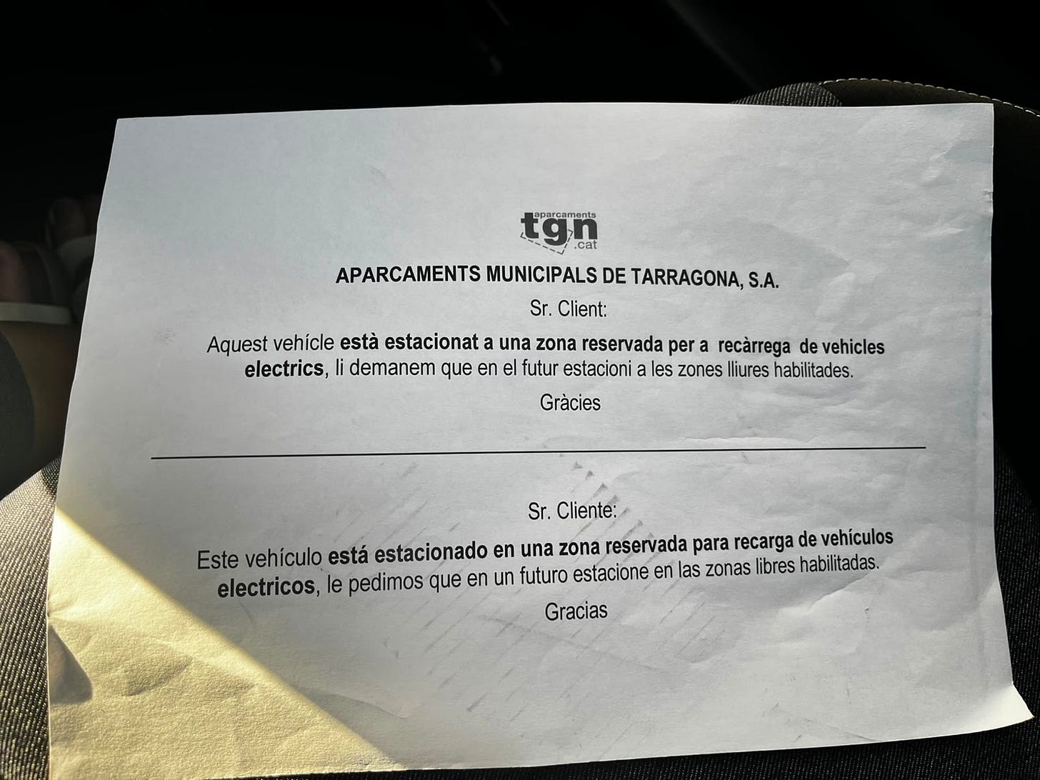Sign left in our car where we tried to charge it in a car park