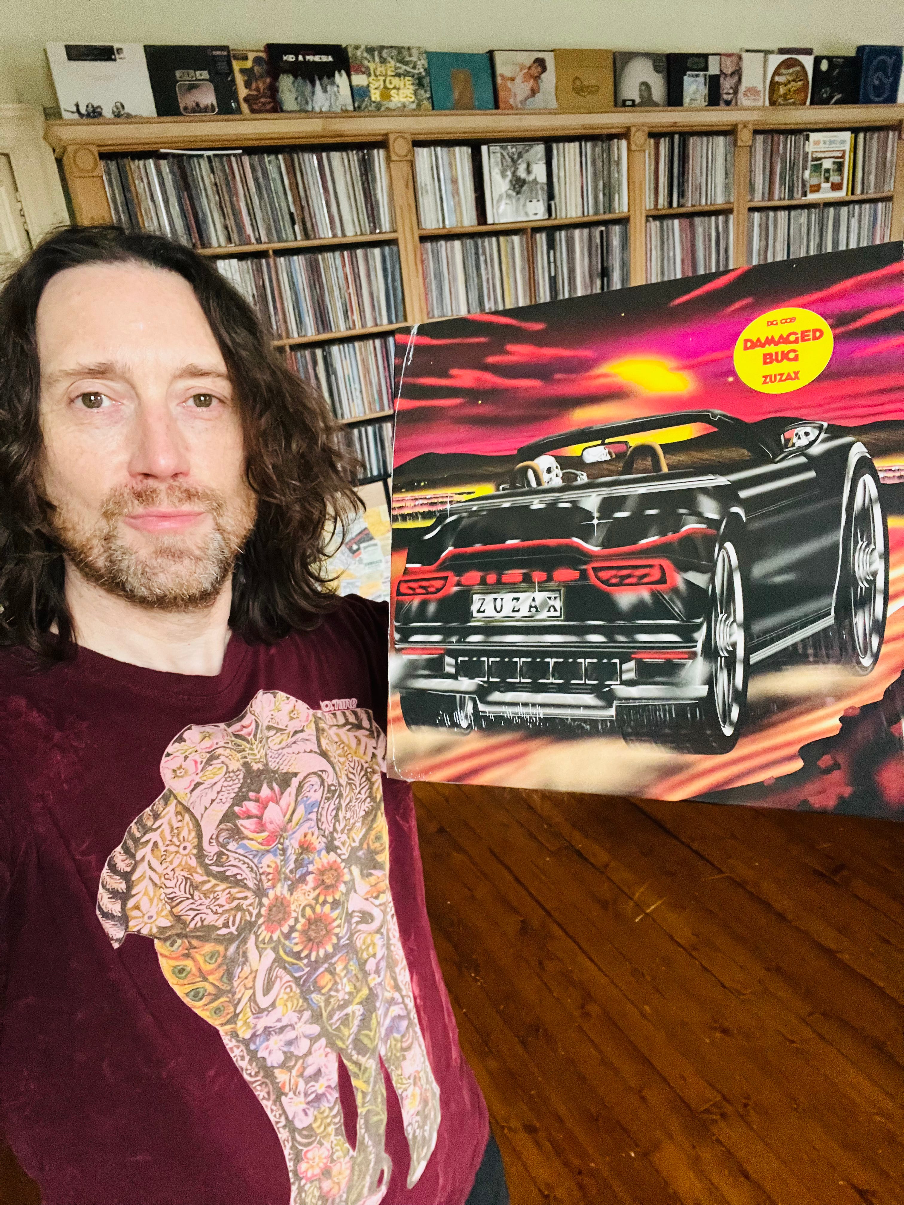 REVIEW: Damaged Bug—Zuzax (2026)