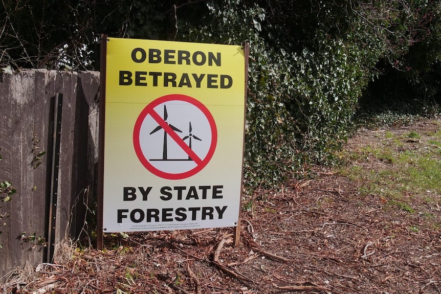 A sign stating Oberon betrayed by state forestry.