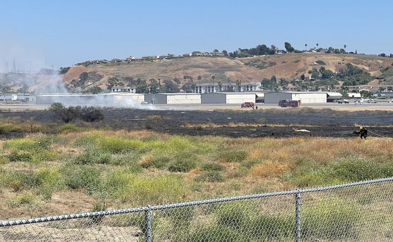 A wildfire at the Oceanside Municipal Airport on Saturday was quickly extinguished by firefighters. The fire burned 3 acres, although the cause is under investigation. Steve Puterski photo A wildfire at the Oceanside Municipal Airport on Saturday was quickly extinguished by firefighters. The fire burned 3 acres, although the cause is under investigation. Steve Puterski photo