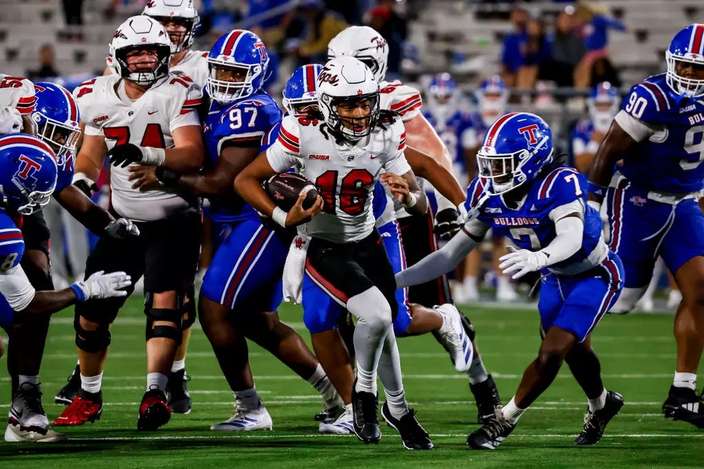 Quarterback Rodney Tisdale, J. (16) | Photo by Savannah Philpot