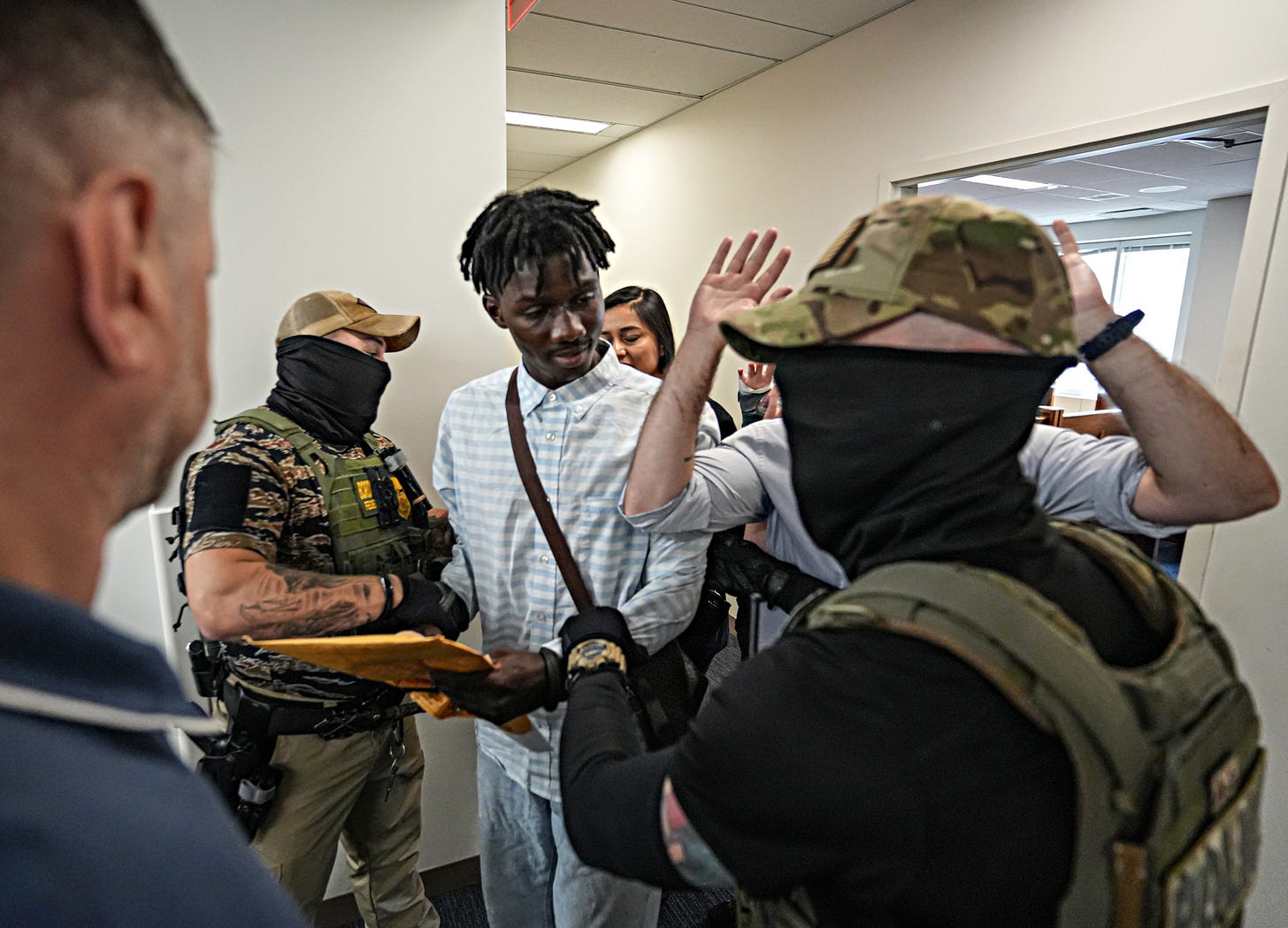 ICE hardens: Masked agents intimidate reporters while seizing more ...