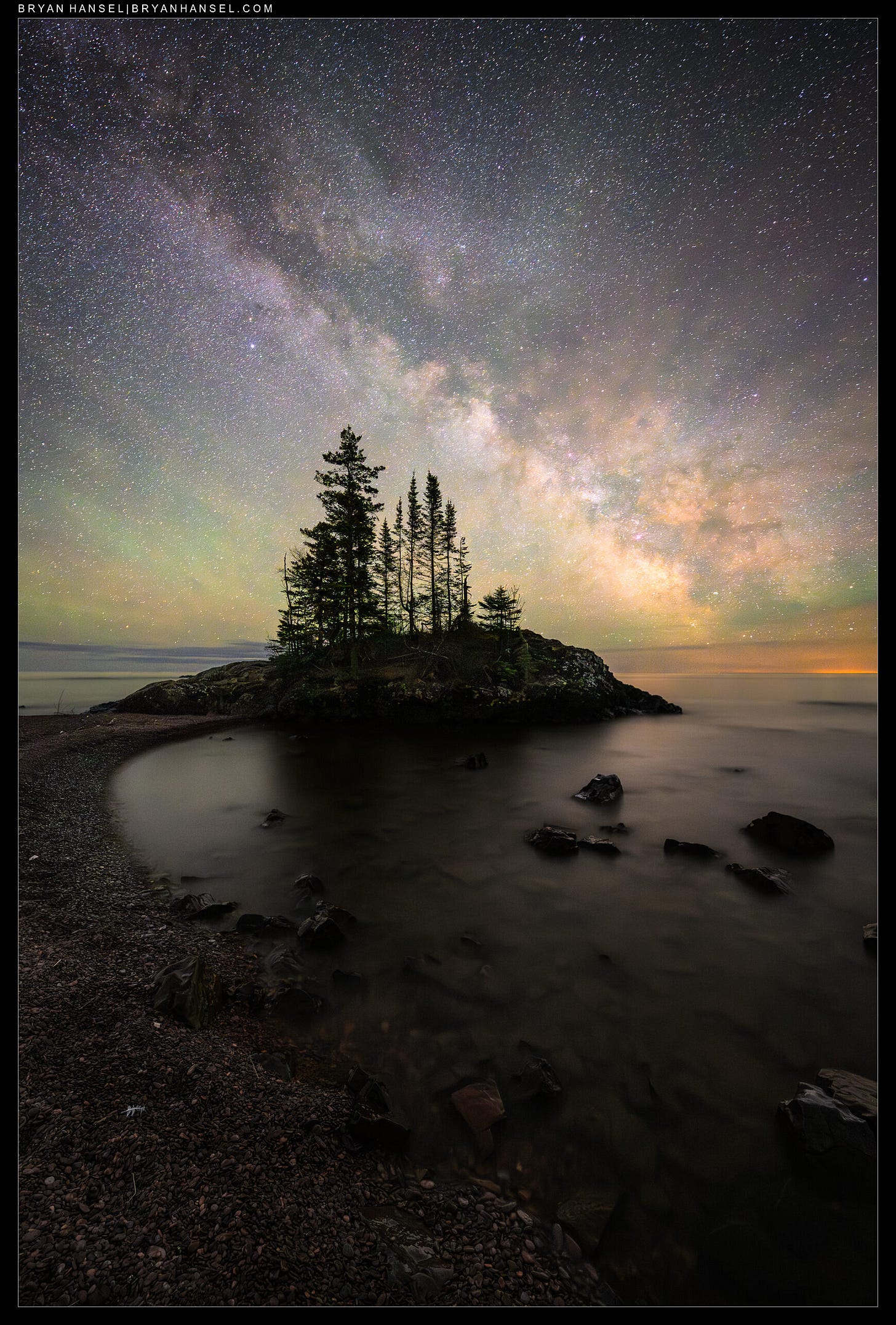 the Milky Way over a small island on Lake Superior.