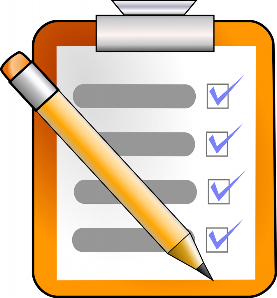 A checklist on a clip board with a pencil laying over the top and check marks marking off lines of writing resources A checklist on a clip board with a pencil laying over the top and check marks marking off lines of writing resources