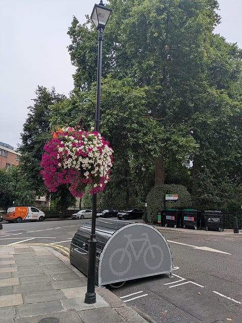 Photos of Cyclehoop secure cycle hangars on various on street locations in Westminster 