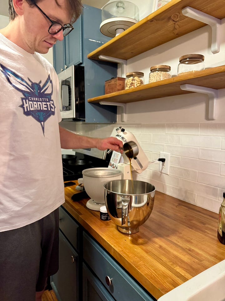 man cooking corn on the grill and baking in the kitchen
