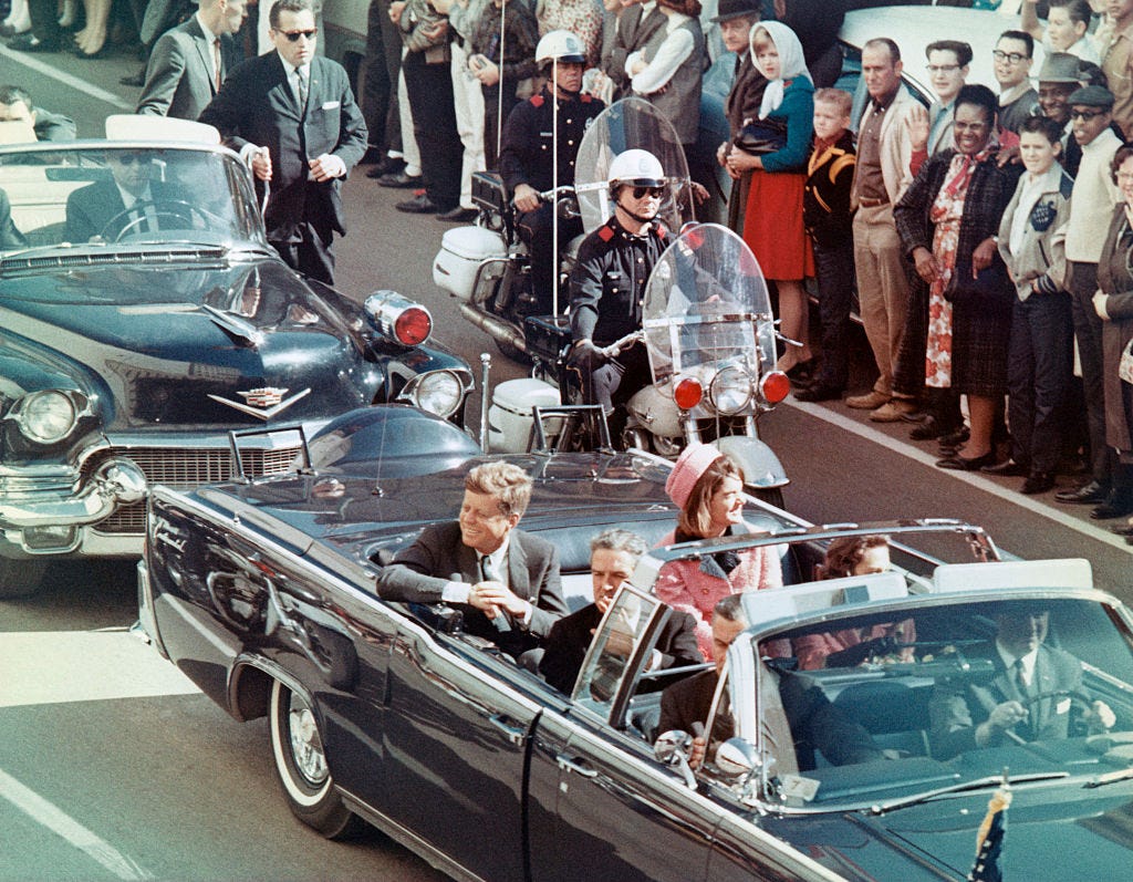 Kennedys Riding in Dallas Motorcade JFK and Jackie Kennedy riding in Dallas motorcade just before the assassination
