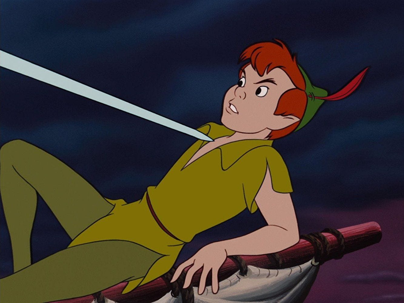 Peter Pan, Anführer der Lost Boys, im giftgrünen Outfit. Doch müssen Jungen sich als ›toxisch‹ rechtfertigen?; Film: Peter Pan (Disney 1953)