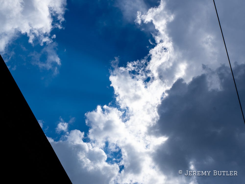 clouds against a blue sky clouds against a blue sky