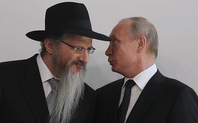 File: Russian President Vladimir Putin (right) speaks with Chief Rabbi of Russia Berel Lazar (left), during a ceremony unveiling the memorial to members of the Jewish resistance in Nazi concentration camps during World War II, at the Jewish Museum and Tolerance Center in Moscow, on June 4, 2019. (Sergei Ilnitsky/Pool/AFP) File: Russian President Vladimir Putin (right) speaks with Chief Rabbi of Russia Berel Lazar (left), during a ceremony unveiling the memorial to members of the Jewish resistance in Nazi concentration camps during World War II, at the Jewish Museum and Tolerance Center in Moscow, on June 4, 2019. (Sergei Ilnitsky/Pool/AFP)