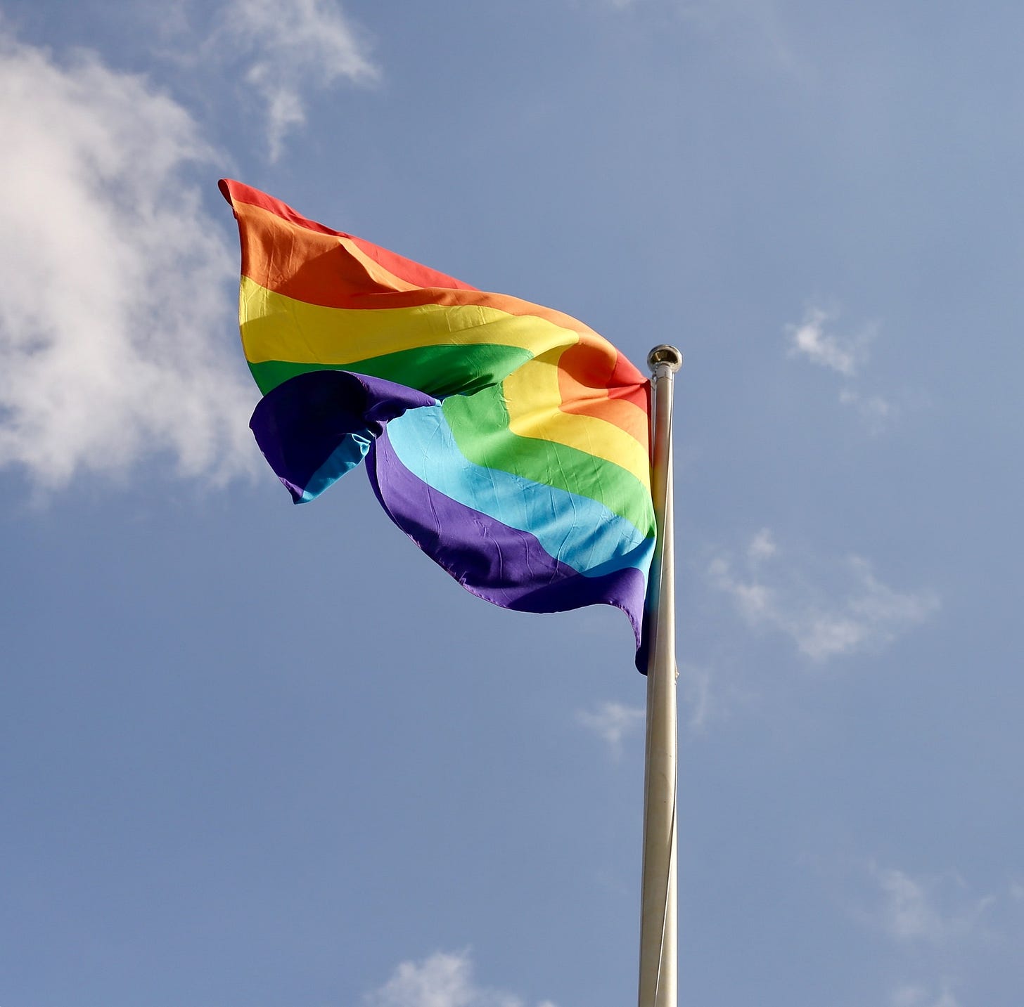 Pride flag blowing in the wind