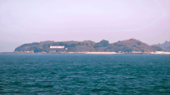 Unify China with the Three Principles of the People" (三民主義統一中國)